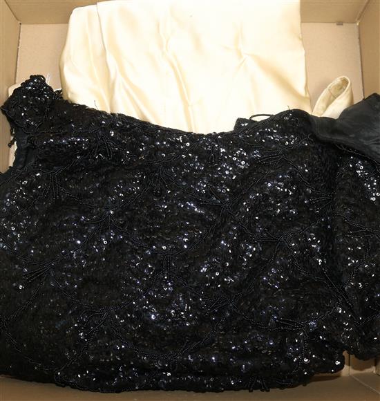 A cream silk and black sequined cocktail dress, and a black beaded and sequined top